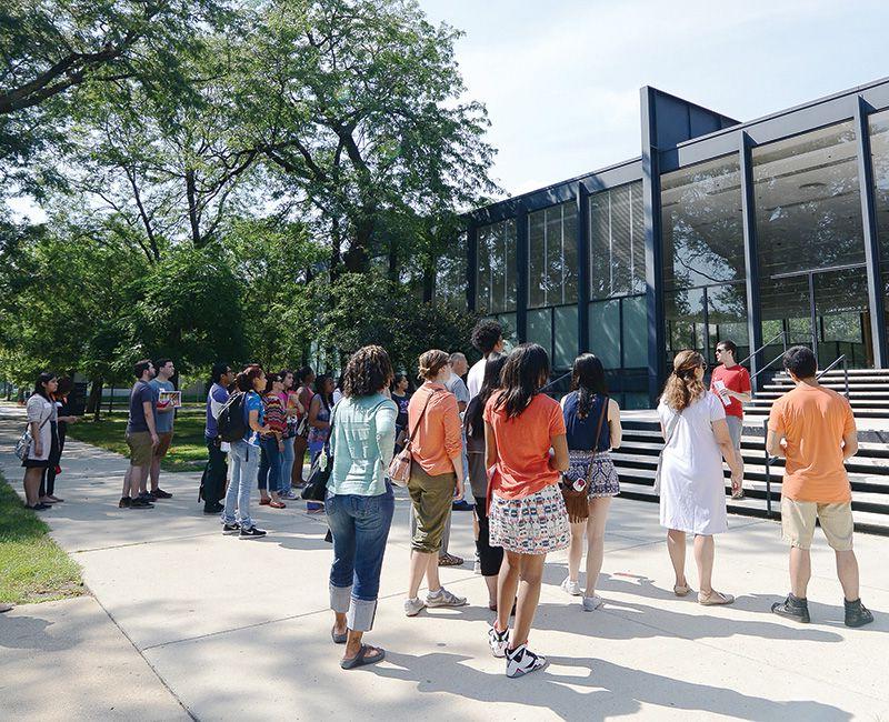 Group of students visiting in front of Crown Hall